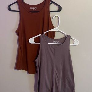 Two XS mudd tank tops